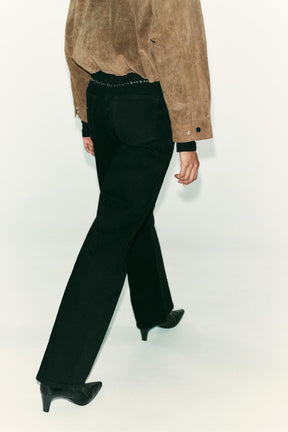 High-waist studded jeans