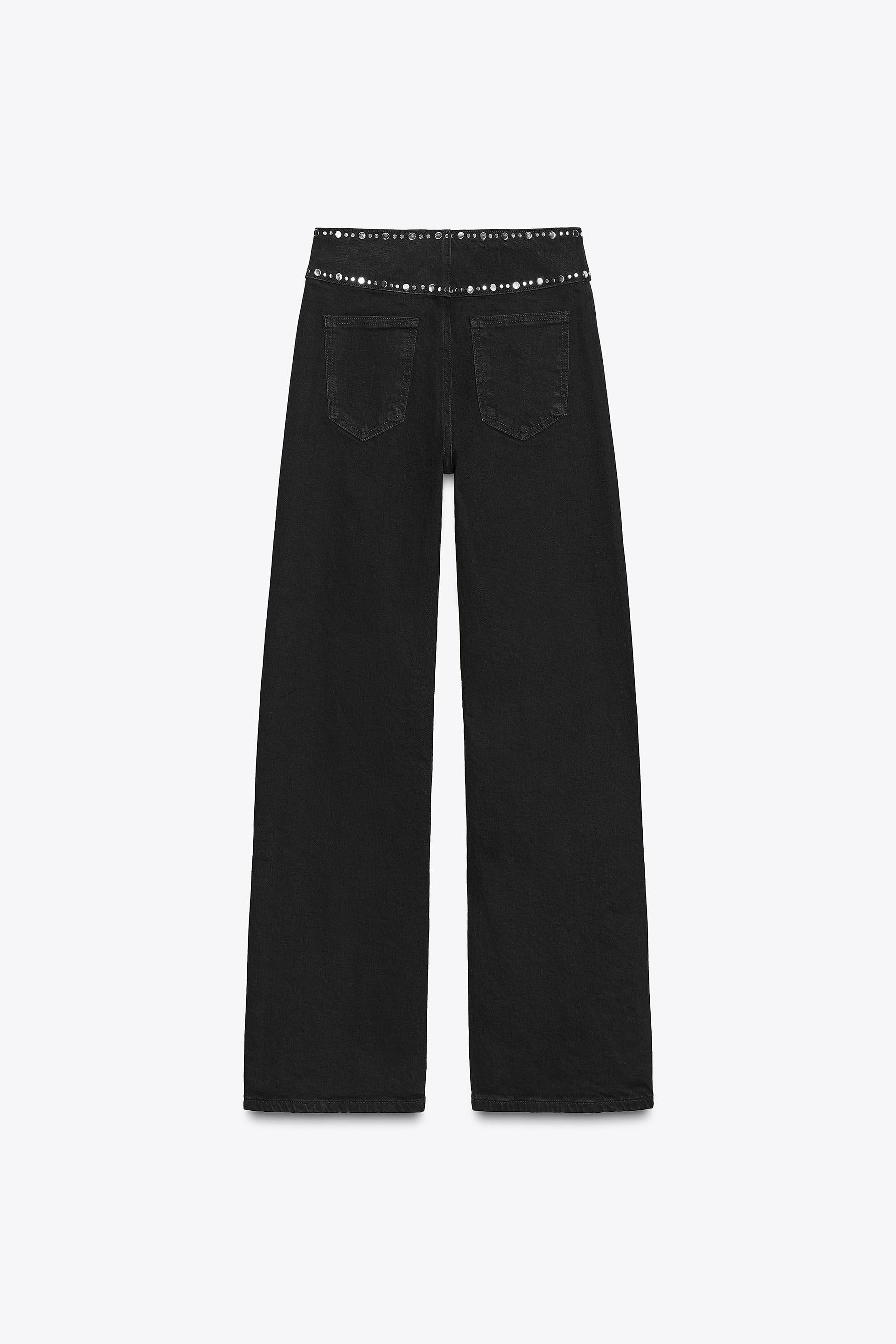 High-waist studded jeans