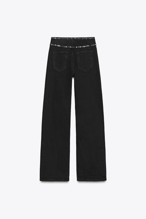 High-waist studded jeans