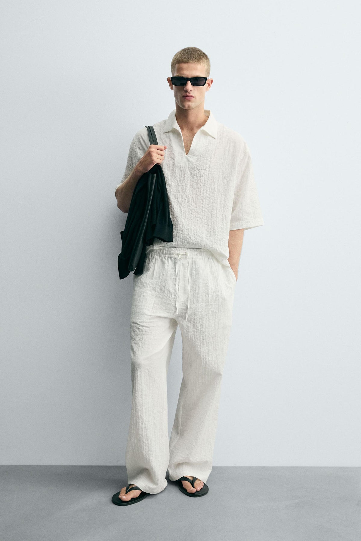 TEXTURED RELAXED FIT TROUSERS - Image 1