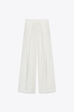 PLEATED TROUSERS WITH FLAPS