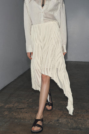 ASYMMETRIC PLEATED SKIRT