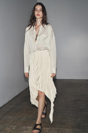 ASYMMETRIC PLEATED SKIRT