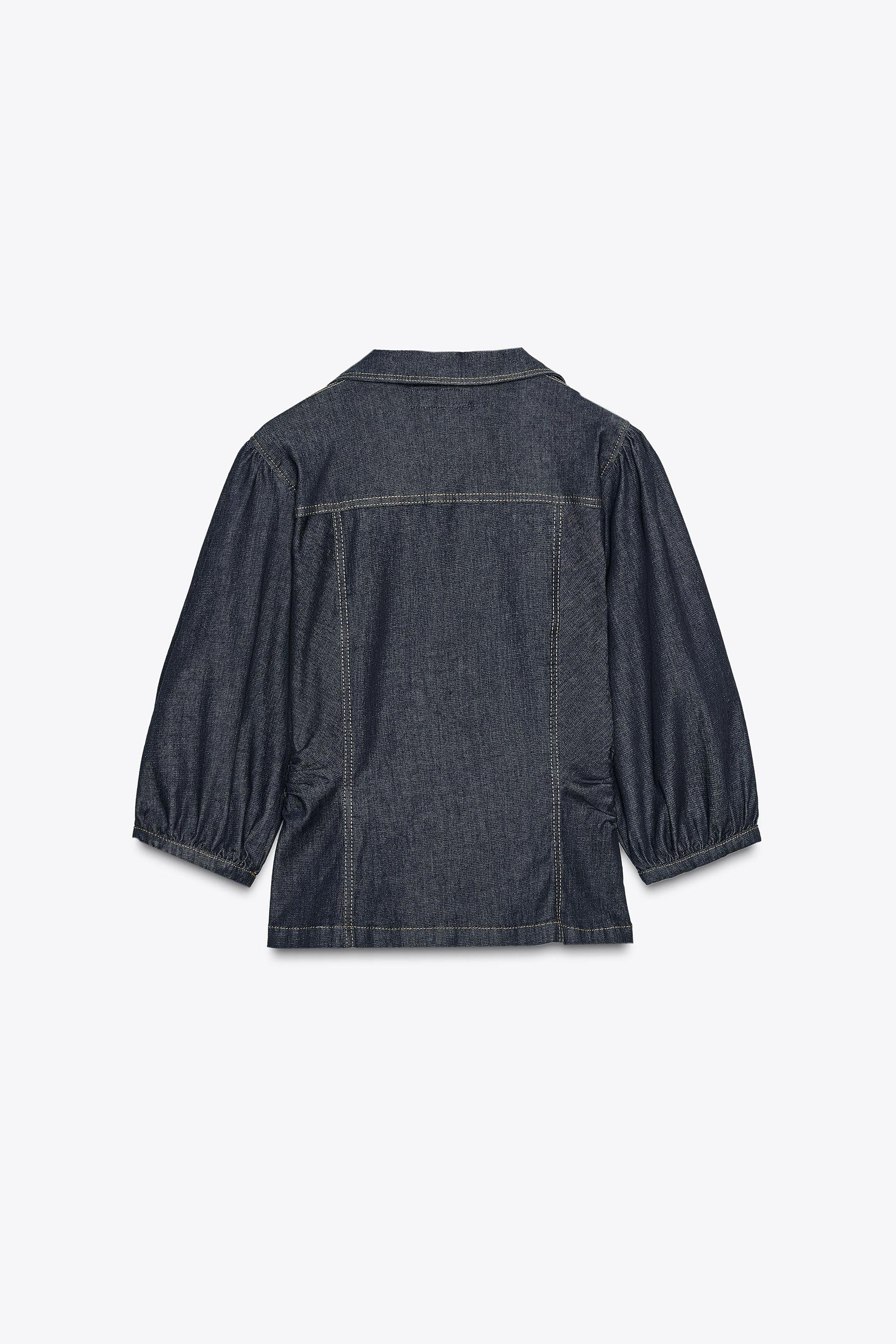 Figurbetonte Jeans mit Puffärmeln