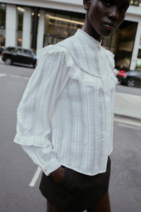 Lace Trimmed Ruffled Blouse