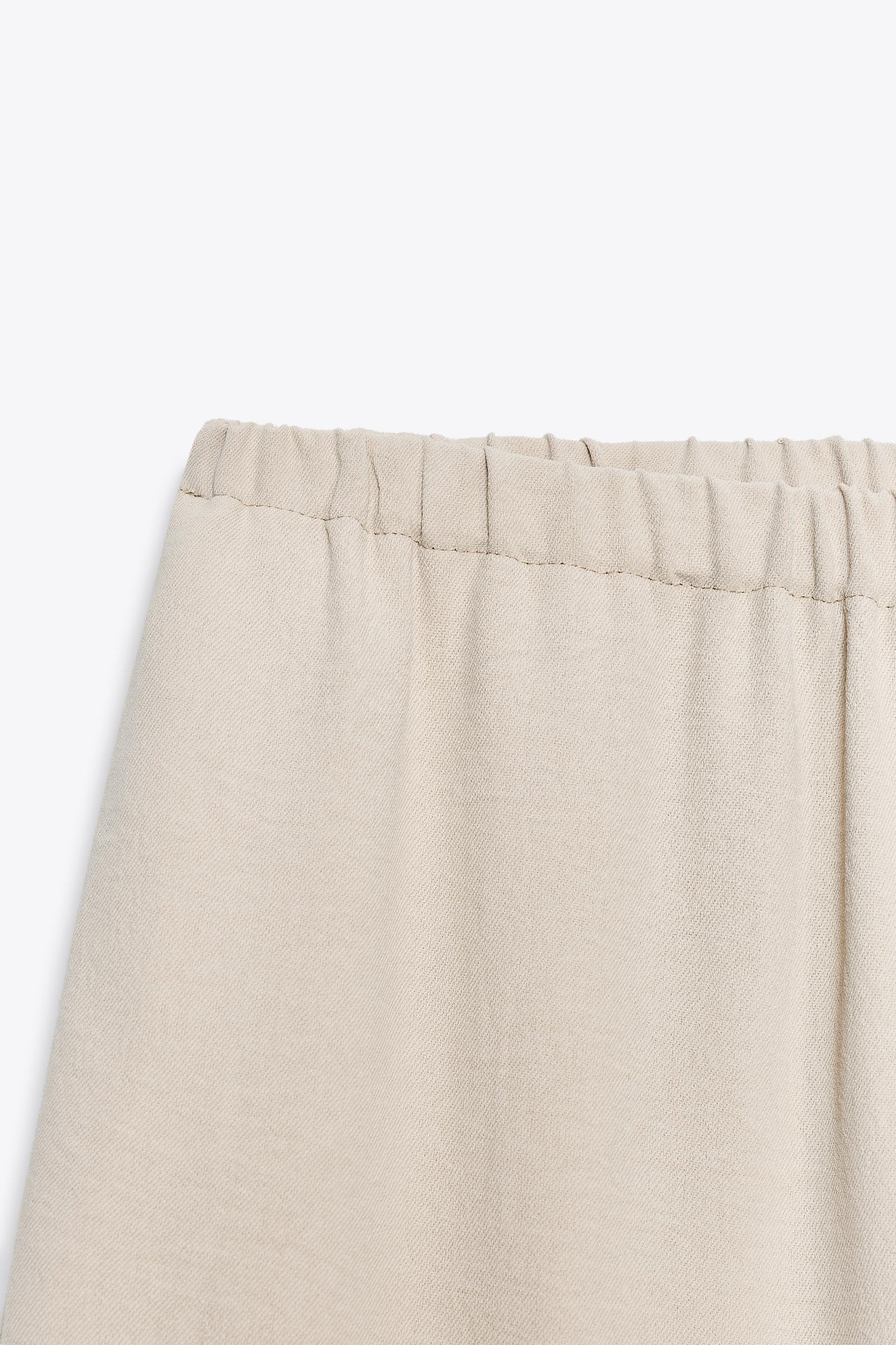 WIDE-LEG FLOWING TROUSERS