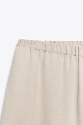 WIDE-LEG FLOWING TROUSERS
