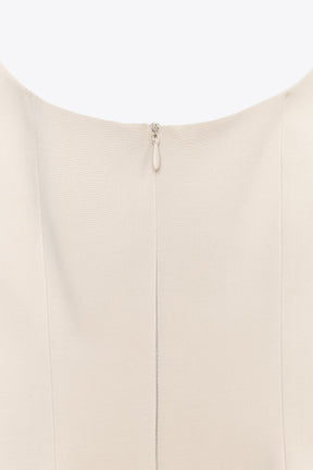 ZIPPED PEPLUM TOP