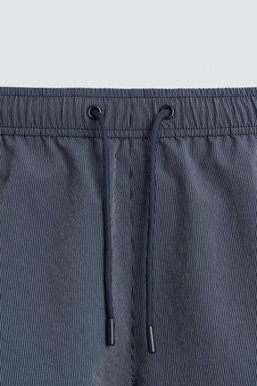 STRIPED MID-LENGTH SWIMMING TRUNKS - Image 8