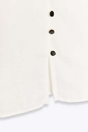 Shirt with shoulder pads