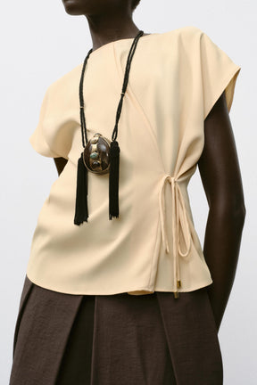 LACE-UP FLOWING TOP