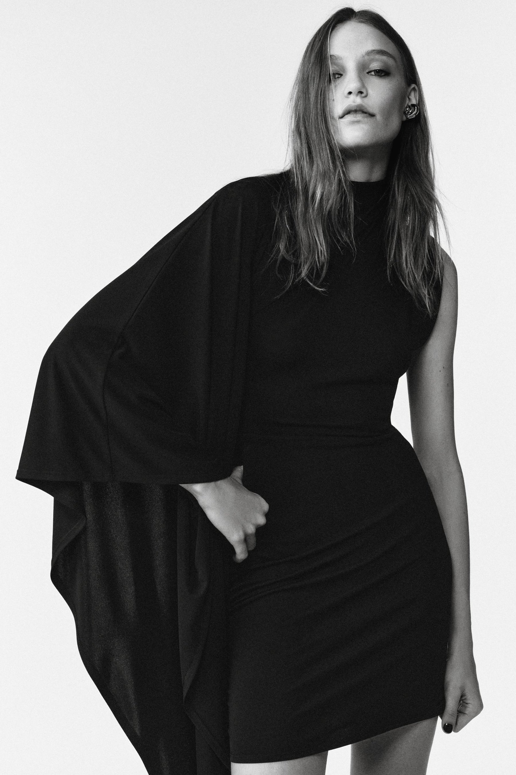 Asymmetric Sleeve Limited Dress