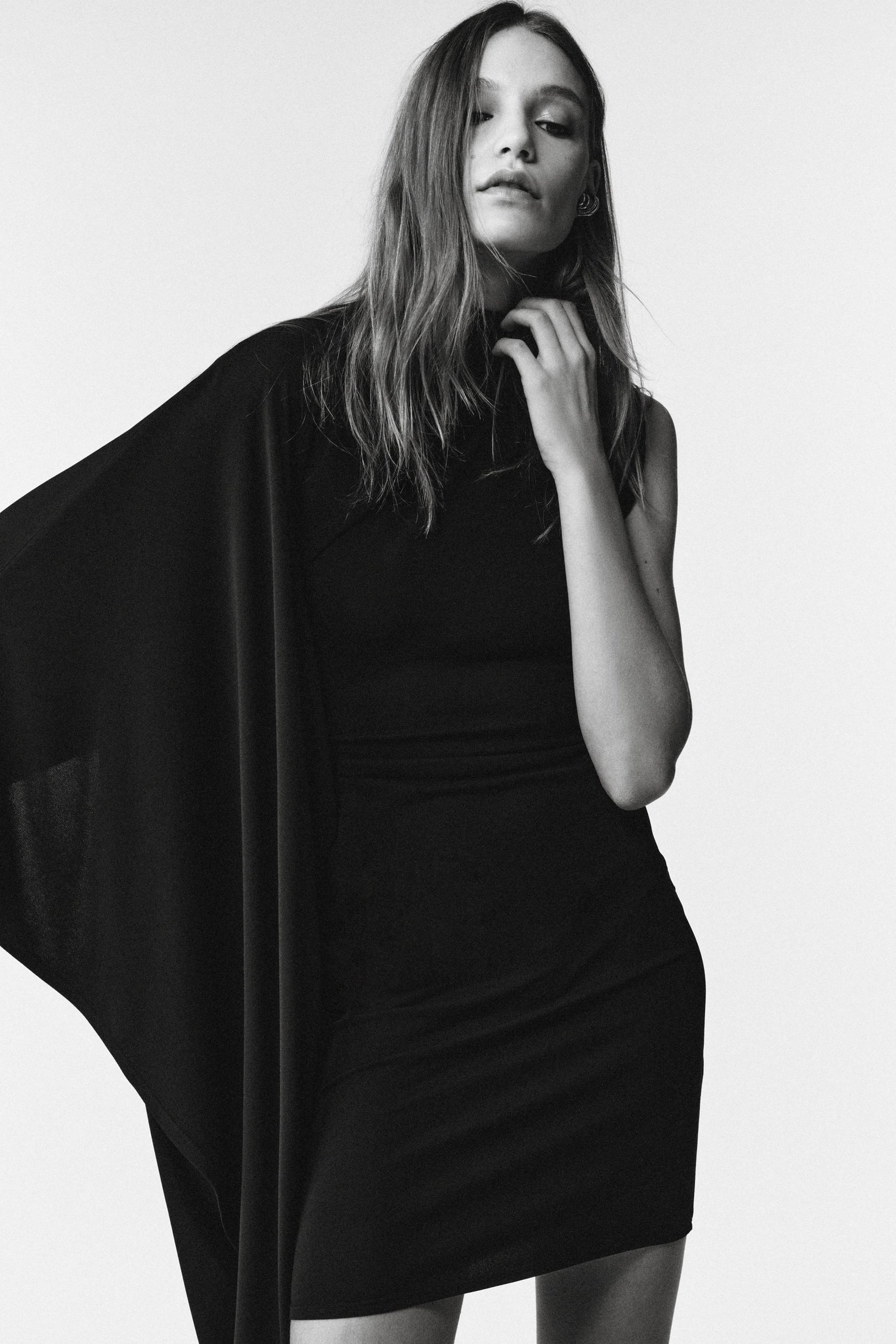 Asymmetric Sleeve Limited Dress