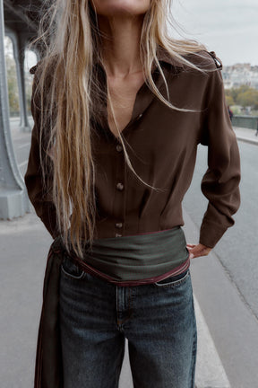 Shirt with shoulder tabs