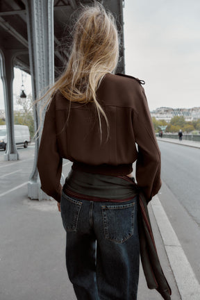 Shirt with shoulder tabs