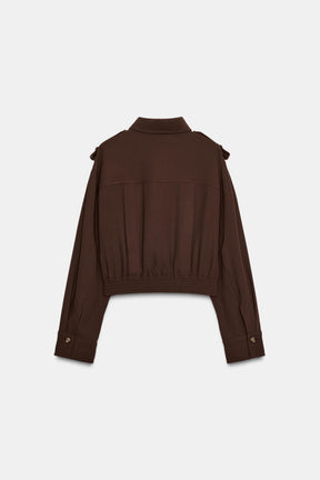 Shirt with shoulder tabs