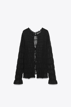 Semi-sheer knit blouse