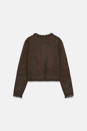 Strickjacke mit eingewebtem Besatz
