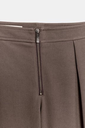Zip-up Carrot Trousers
