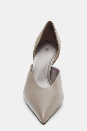Lederschuhe mit hohen Absätzen