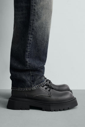 DISTRESSED CHUNKY LACE-UP BOOTS - Image 1