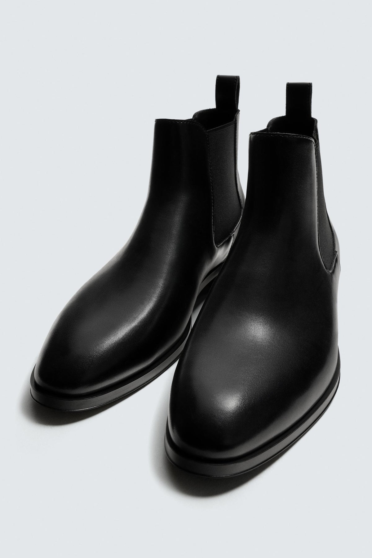 Spitz zulaufende Chelsea Boots