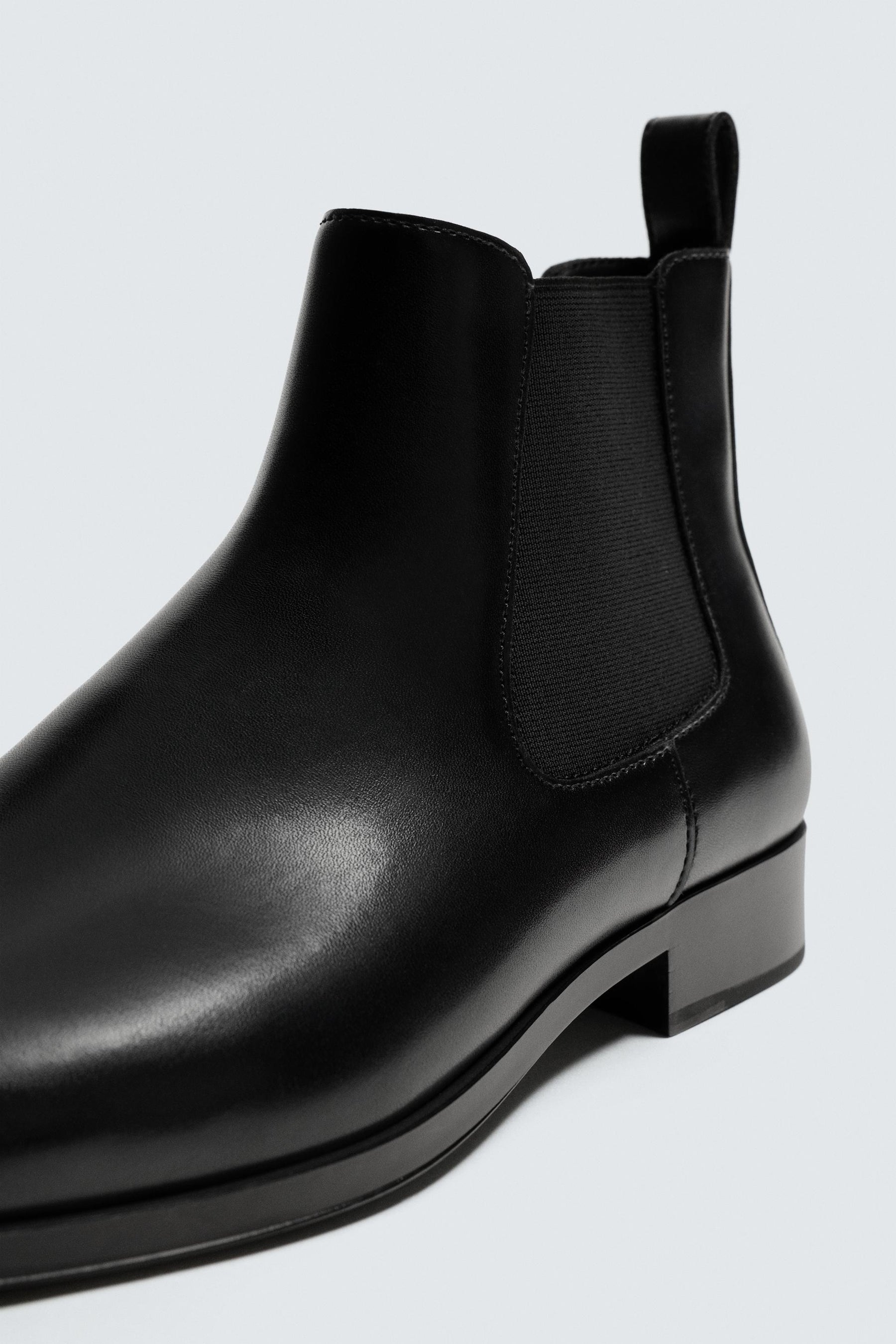 Spitz zulaufende Chelsea Boots