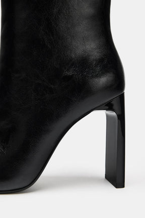 POINTED HEELED BOOTS