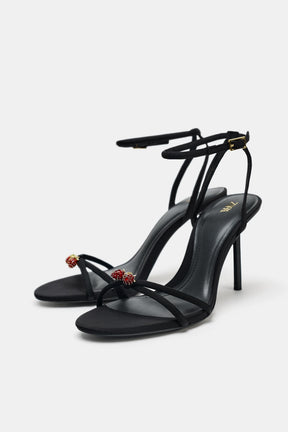 BEADED CROSSOVER SANDALS