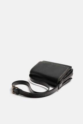 DISTRESSED-EFFECT FLAP CROSSBODY BAG