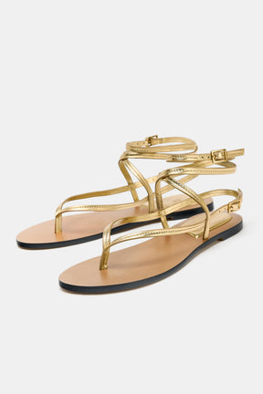 Ledersandalen mit Riemchen und Metallic-Effekt