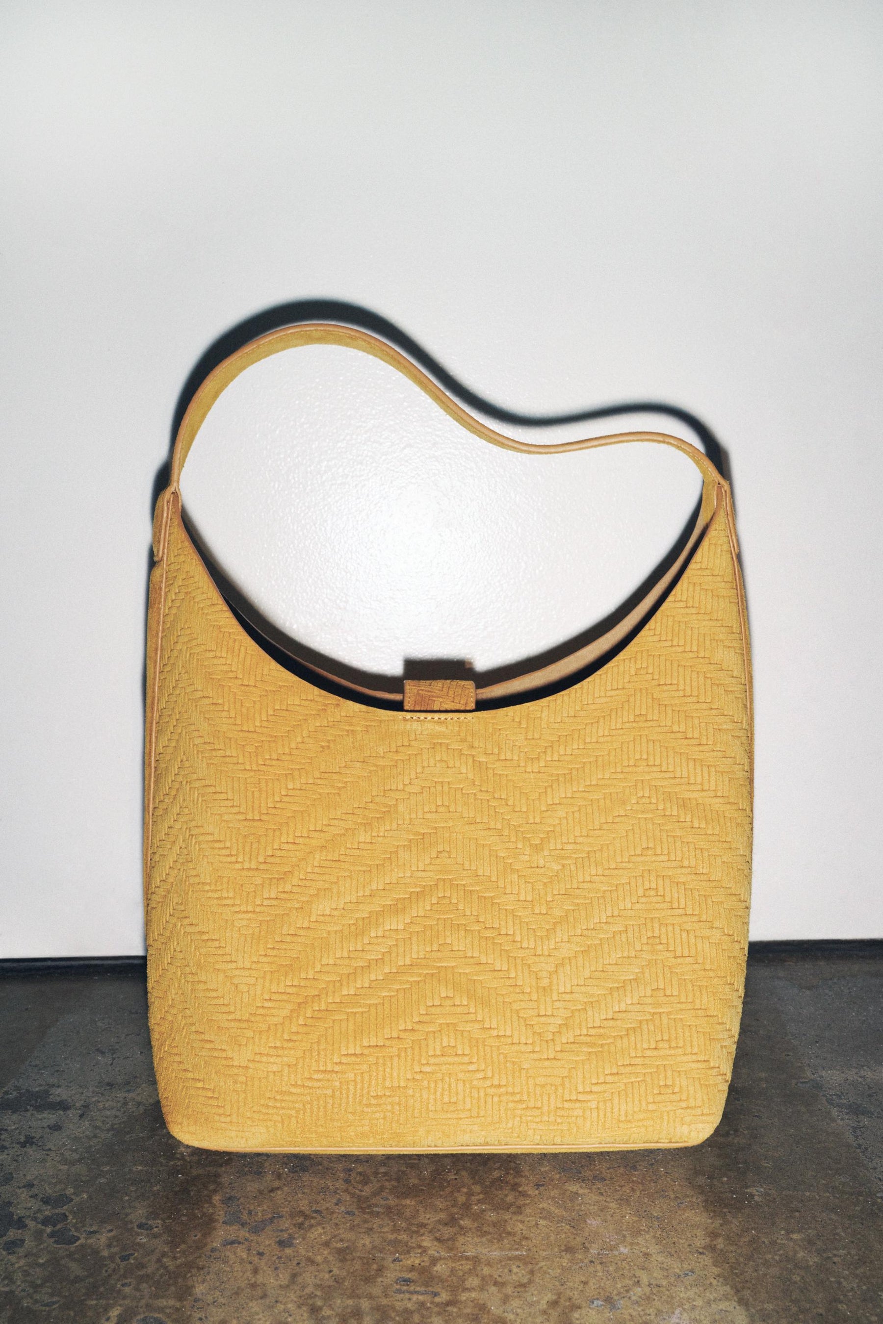 GEFLOCHTENE WILDLEDERTASCHE