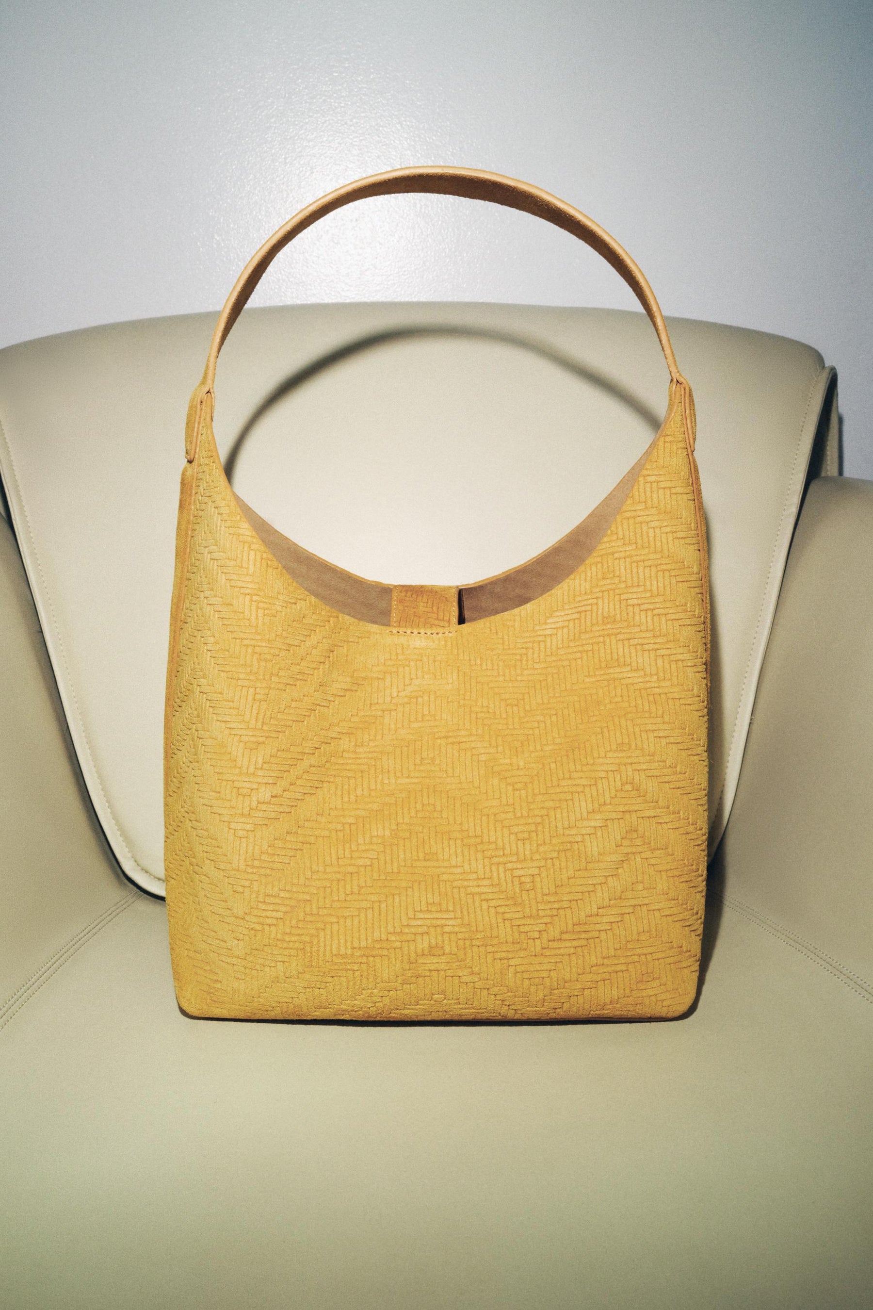 GEFLOCHTENE WILDLEDERTASCHE
