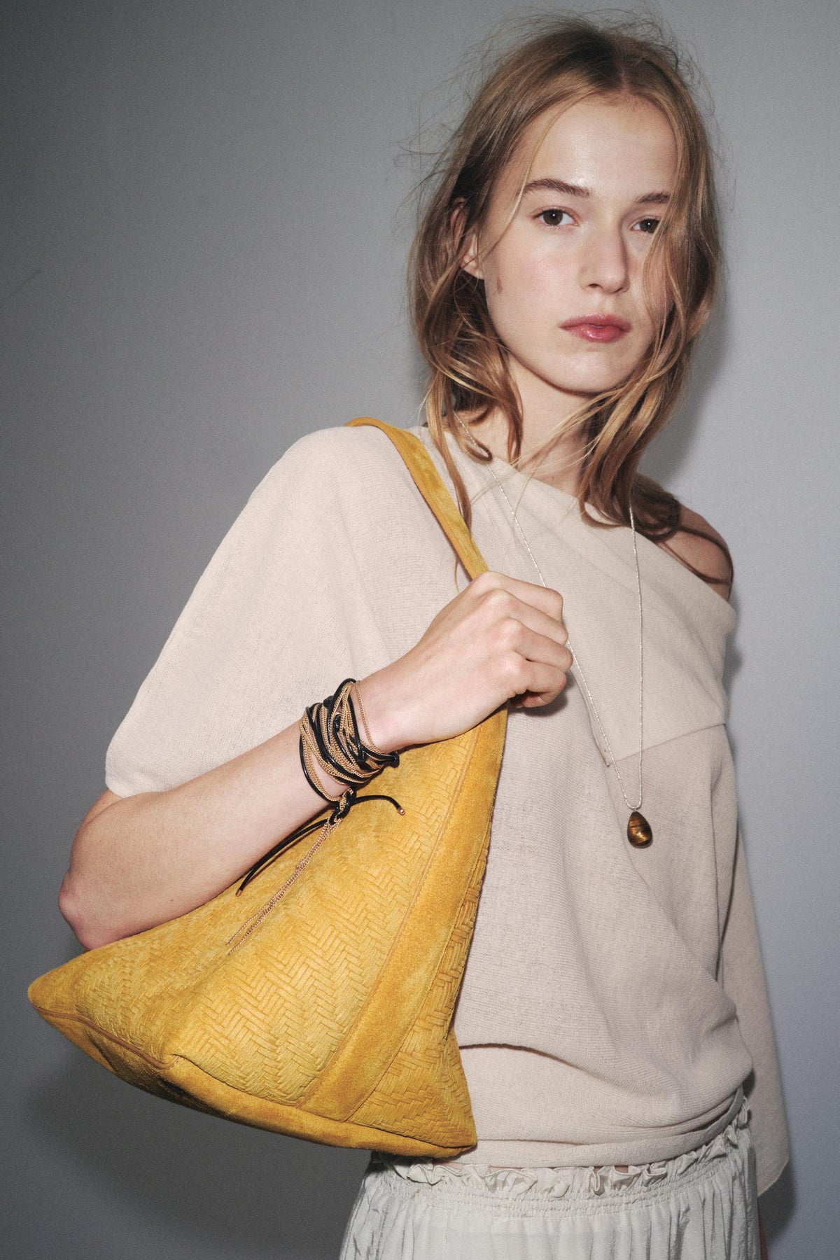 GEFLOCHTENE WILDLEDERTASCHE