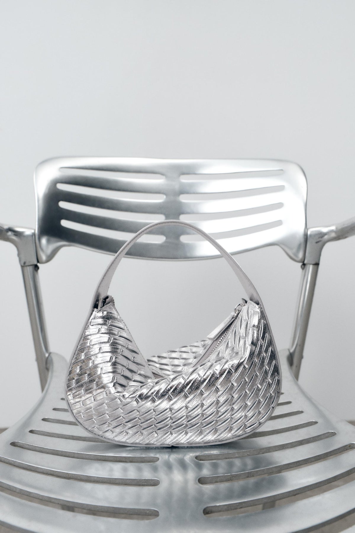 BRAIDED HANDBAG