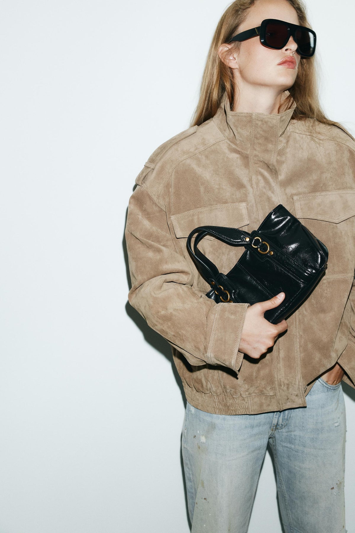 HANDBAG WITH METAL DETAILS